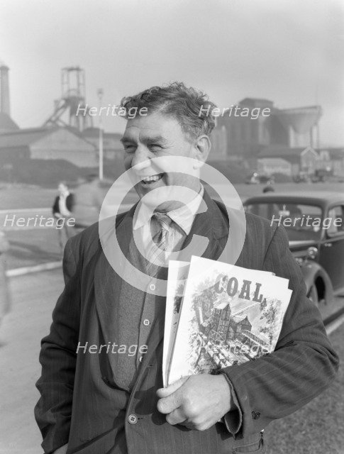 NUM official selling Coal magazine, South Yorkshire, 1959. Artist: Michael Walters