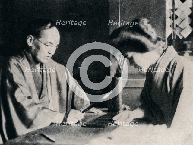 'While Yuki's fortune was being told I photographed her', c1900, (1921). Artist: Julian Leonard Street.