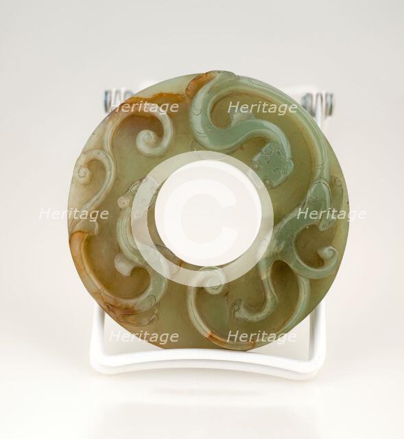 Disc with two animals in relief. Creator: Unknown.