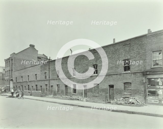 Row of derelict houses, Hackney, London, August 1937. Artist: Unknown.