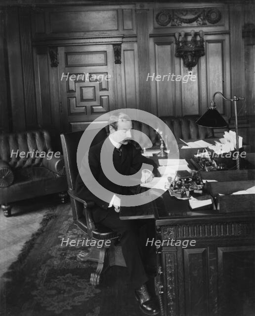 Herbert Putnam in his office. Librarian of Congress, between 1890 and 1910. Creator: Unknown.