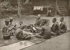 'Buddhist Priest with Pupils', 1900. Creator: Unknown.