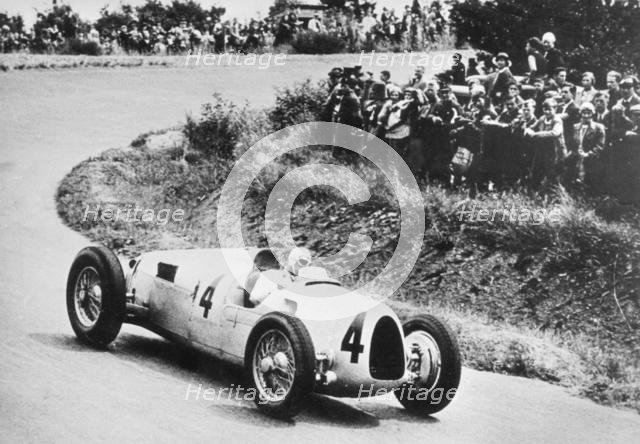1936 Auto Union C type, Rosemeyer at German Grand Prix. Creator: Unknown.