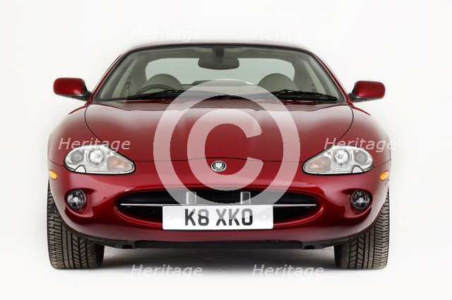 1999 Jaguar XK8 coupe Artist: Unknown.