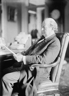 William Jennings Bryan, Rep. from Nebraska, at desk, 1914. Creator: Harris & Ewing.