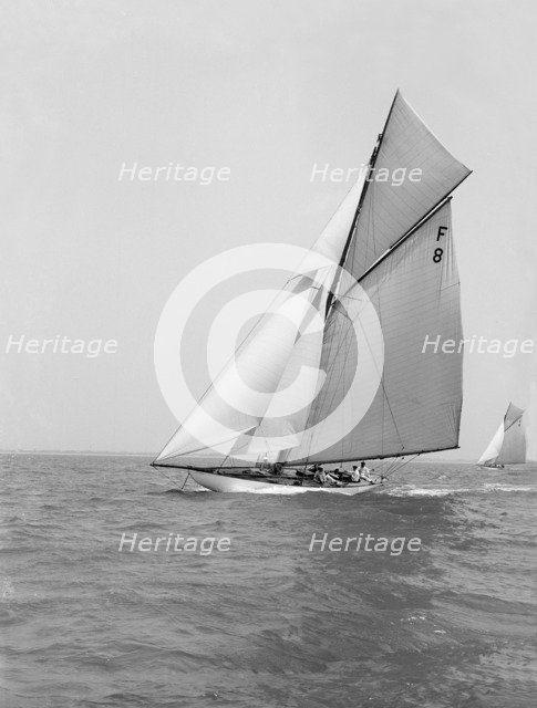 The 10 Metre class 'Pampero' (F8) sailing close-hauled, 1914. Creator: Kirk & Sons of Cowes.