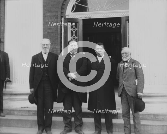 (Left to right) Robert C. Ogden, U.S. Secretary of War William Howard Taft, Booker T..., 1906. Creator: Frances Benjamin Johnston.