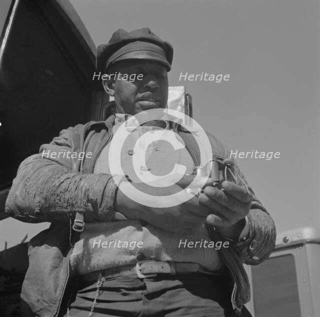 Bus driver, Daytona Beach, Florida, 1943. Creator: Gordon Parks.