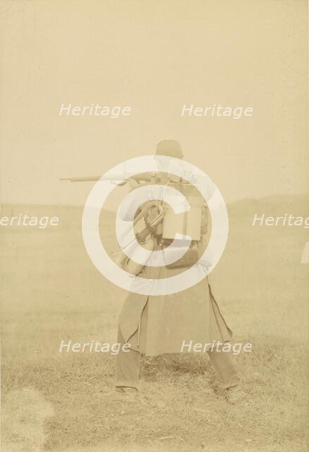 [Standing Soldier Aiming Rifle], 1880s-90s. Creator: Unknown.