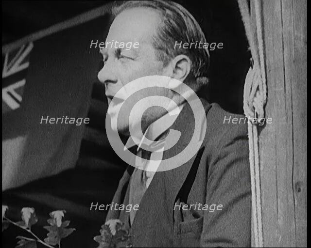 British President of the Board of Trade Stanley Baldwin Giving a Speech from a Platform in..., 1922. Creator: British Pathe Ltd.