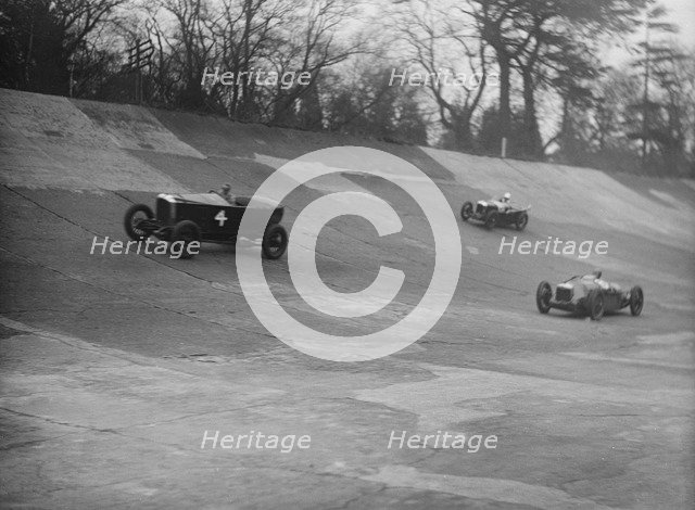 Vauxhall, Riley and Amilcar racing at a BARC meeting, Brooklands, Surrey, 1931 Artist: Bill Brunell.