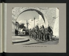 A Sudan Defence Force unit enters Tripoli, 1943. Showing Tripoli Castle on Piazza Italia. Creators: Colonial Office, Unknown.