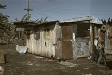 Shacks of Negro migratory workers, Belle Glade, Fla., 1941. Creator: Marion Post Wolcott.