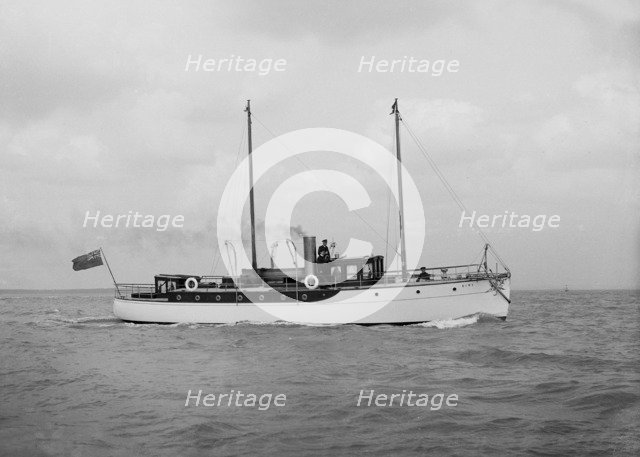 The 23 ton motor yacht 'Kiwi' under way, 1914. Creator: Kirk & Sons of Cowes.