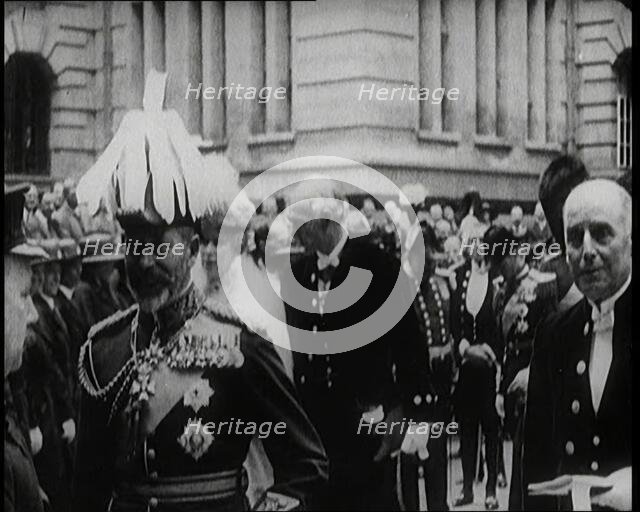 King George V Talking to a British Officer, Queen Mary Can Be Seen Behind Him, 1922. Creator: British Pathe Ltd.