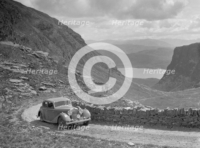SS Jaguar of CL Bembridge competing in the RSAC Scottish Rally, 1936. Artist: Bill Brunell.