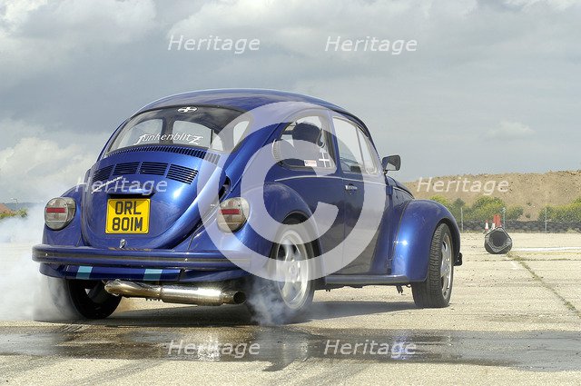 VW Beetle Burning out. Artist: Unknown.
