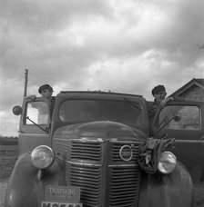 Men with a lorry at the sugar mill in Arlöv, Scania, Sweden, c1940s(?). Artist: Otto Ohm