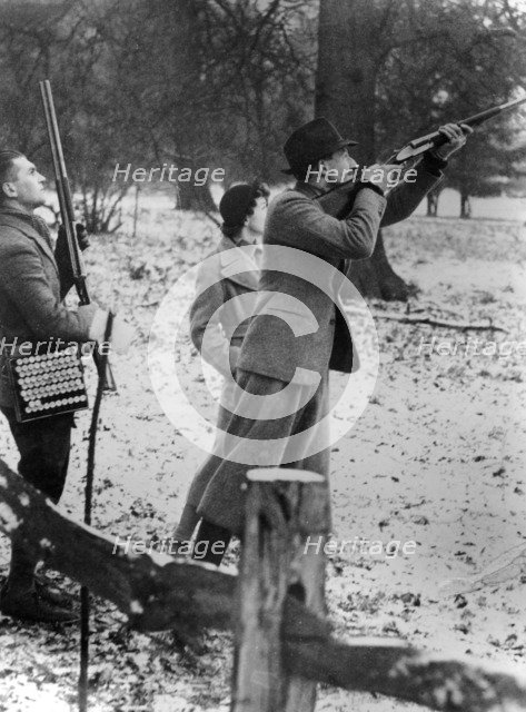 Earl of Shrewsbury, Miss Lane and their chauffeur on a shoot, c1946. Artist: Unknown