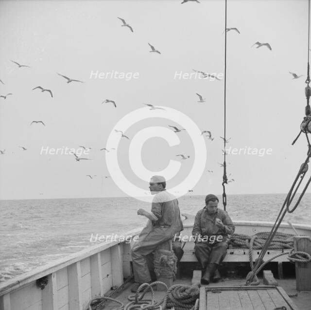On board the fishing boat Alden, out of Gloucester, Massachusetts, 1943. Creator: Gordon Parks.