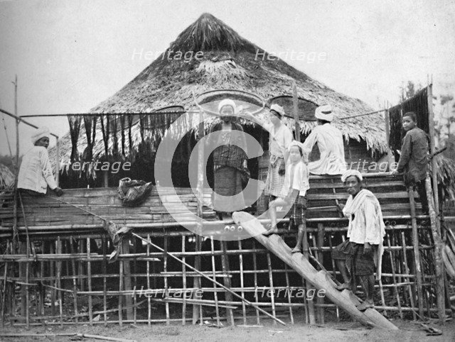 Hindu fakirs and a native dwelling, 1902. Artist: Bourne & Shepherd.