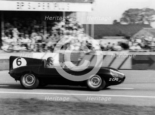 Duncan Hamilton driving a Jaguar D type, RAC Tourist Trophy, Goodwood, Sussex, 1958. Creator: Unknown.