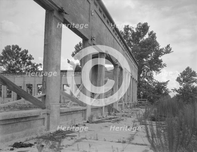 Remains of drug store at Fullerton, Louisiana, an abandoned lumber town, 1937. Creator: Dorothea Lange.