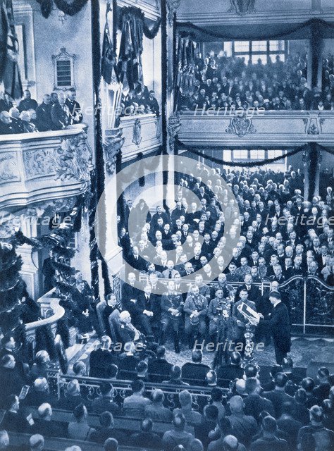 Adolf Hitler reads the Enabling Law in the Garrison Church at Potsdam, 21st March 1933. Artist: Unknown