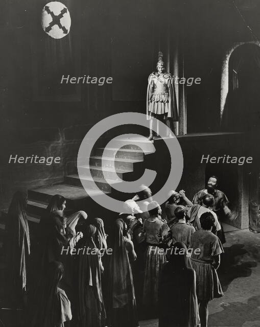 Man standing above crowd, 1938. Creator: Unknown.