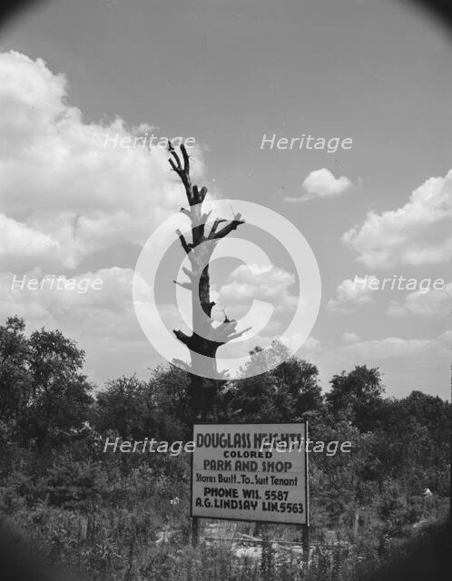 Sign on Alabama Avenue, Frederick Douglass housing project, Anacostia, D.C (vicinity), 1942. Creator: Gordon Parks.
