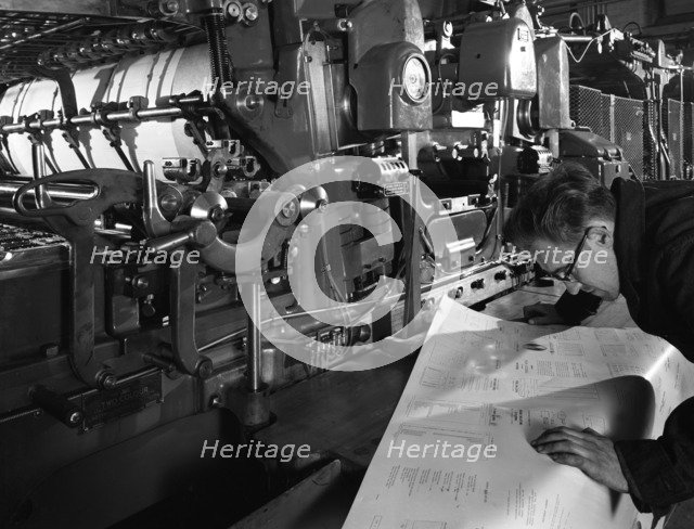 Checking printed pages from a two colour press, Mexborough, South Yorkshire, 1959. Artist: Michael Walters