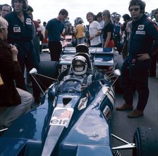 Jackie Stewart at the wheel of a racing car, driving for Tyrrell, c1971-c1973. Artist: Unknown