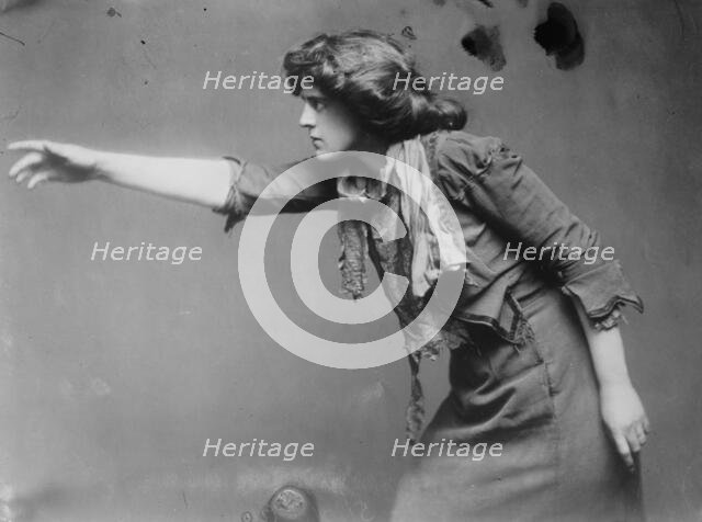 Gertrude Elliott posing with arm outstretched, 1910. Creator: Bain News Service.