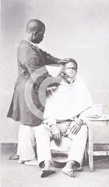 Barber and client, Brazil, 1890 (Inferred). Creator: Unknown.