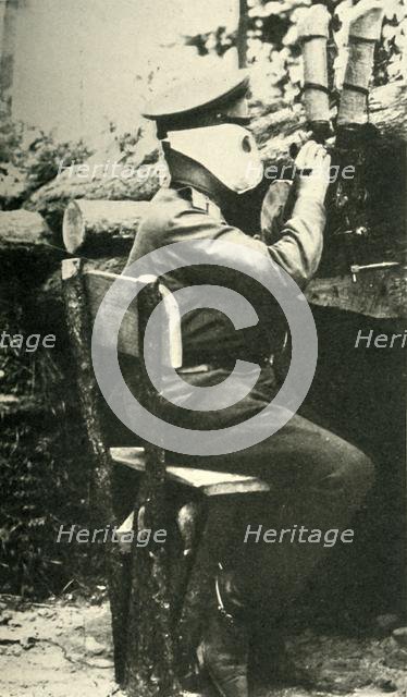 Russian soldier using a periscope rifle, First World War, 1914-1918, (c1920). Creator: Unknown.