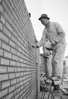 A bricklayer at work, Landskrona, Sweden, 1965. Artist: Unknown