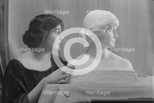 Woodruff, Eleanor, Miss, with portrait bust, portrait photograph, ca. 1914. Creator: Arnold Genthe.