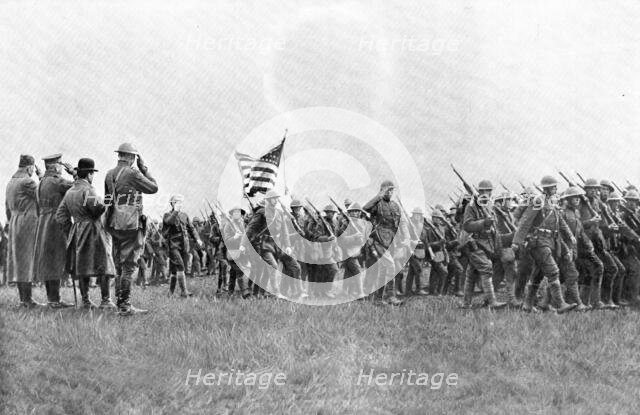 'Les combattants de l'Amerique; Un des premiers regiments Americains engages, le 18th..., 1917. Creator: Unknown.