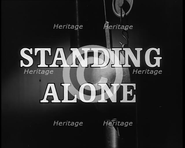 'Standing Alone' - title card, 1940.  Creator: British Pathe Ltd.