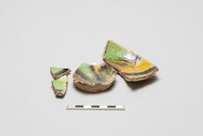 sherd, red body, white slip, yellow, green, black glaze, Mamluk period, 1250-1516. Creator: Unknown.