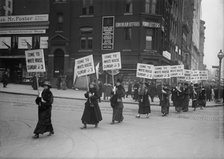 Woman Suffrage - Marching with Inv. Signs, 1917. Creator: Harris & Ewing.