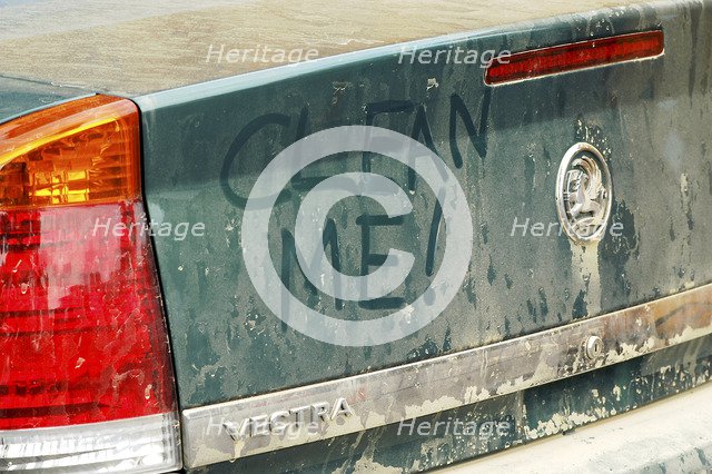 Graffiti on dirty Vauxhall Vectra 2003. Artist: Unknown.