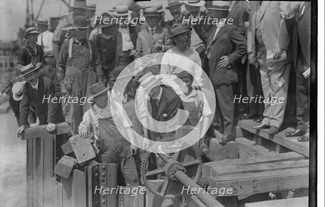 Mayor Mitchel opens gates, between c1915 and c1920. Creator: Bain News Service.